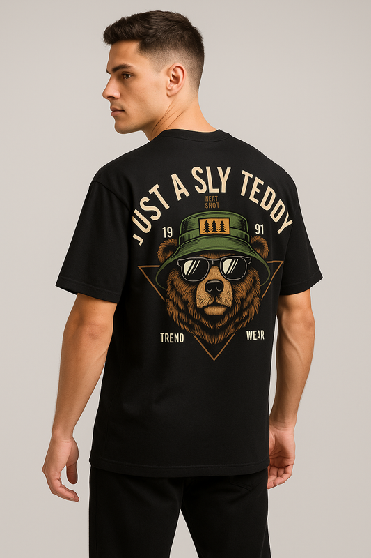 Man wearing a black t-shirt with a bear graphic and text on a plain background